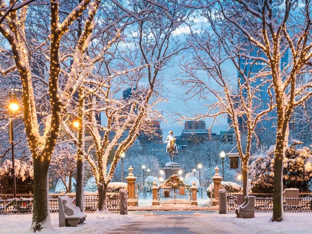 View of Boston in Massachusetts, USA in the winter season at Commonwealth Avenue with snow and Christmas lights.