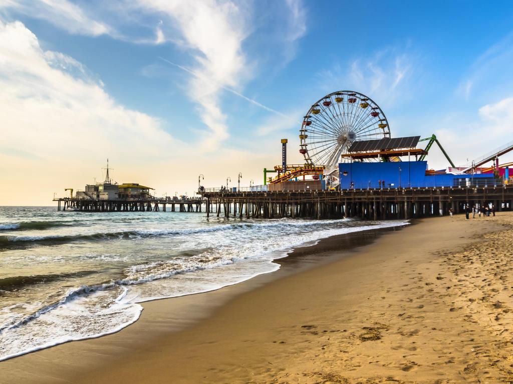 Santa Monica Pier views from the beach on a sunny winter day.