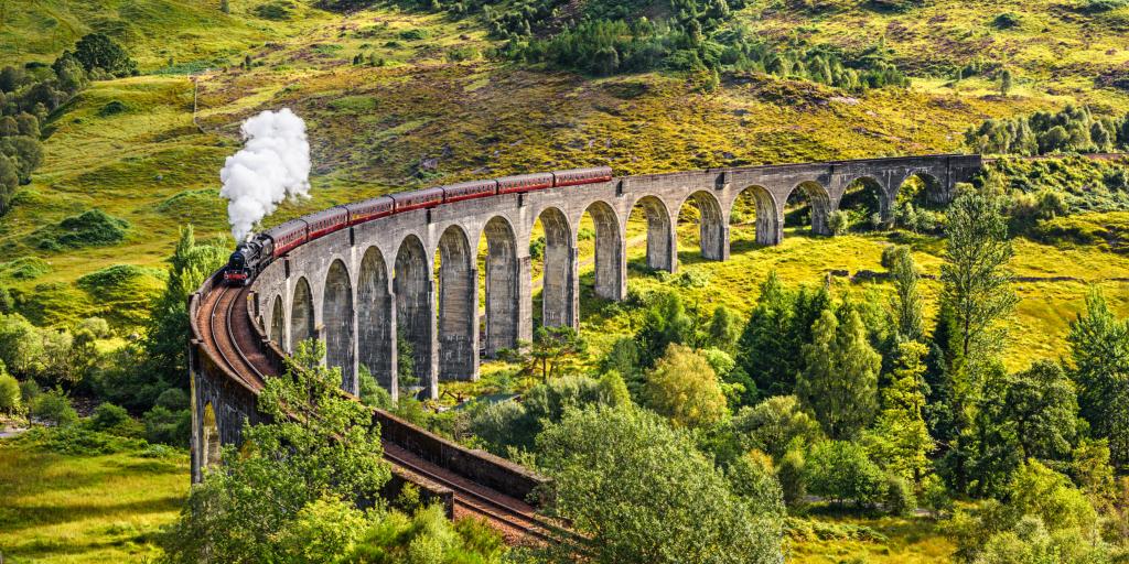 A train going over the Glenfinnan Viaduct in Scotland 