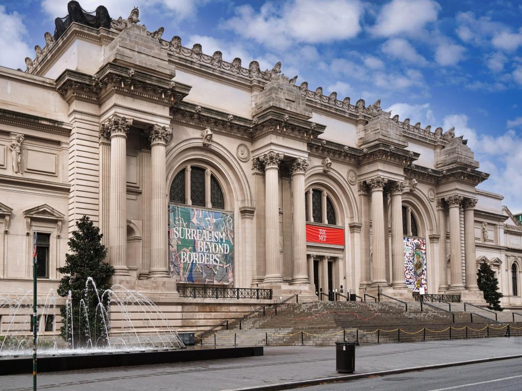 The facade of the famous museum in New York City on a sunny day without people