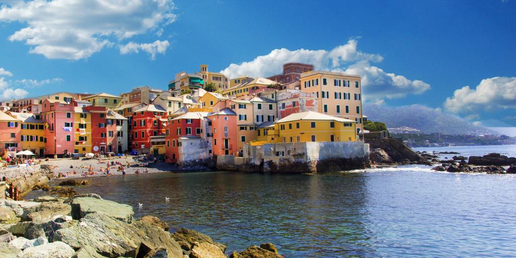 Colourful houses hug the coastline in Genoa, north Italy