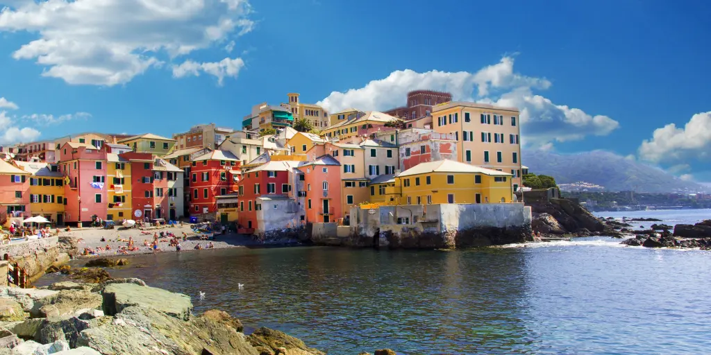 Colourful houses hug the coastline in Genoa, north Italy