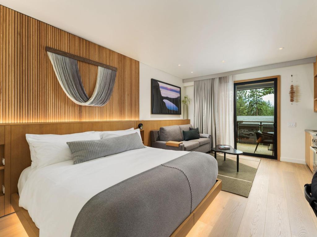 Contemporary interior of modern grey and wood furnished bedroom at Desolation Hotel, Lake Tahoe