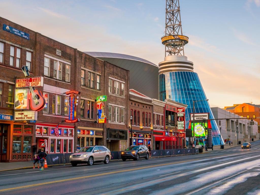 Nashville, Tennessee, USA with neon signs on Lower Broadway Area  just before sunset.