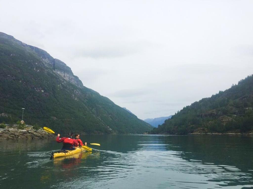 Setting off in a two-person kayak in the fjords of Norway