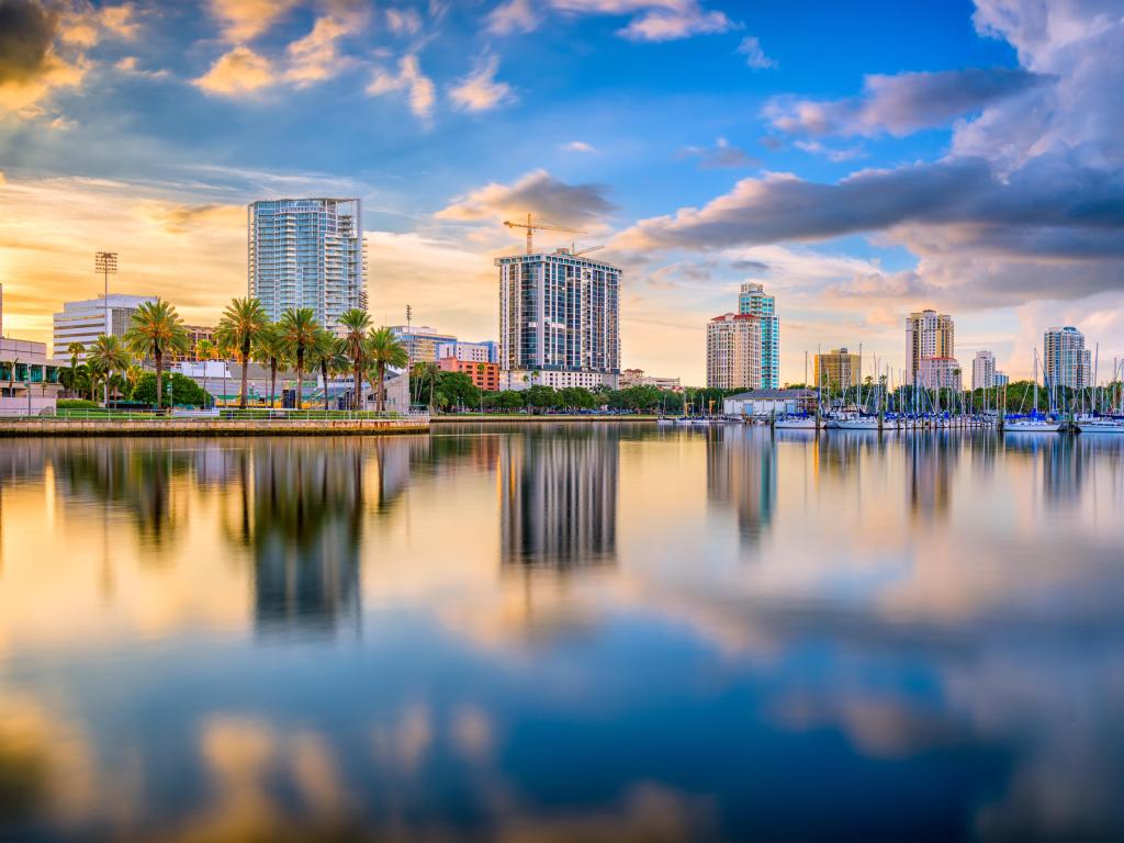 St. Petersburg, Florida, USA with the downtown city skyline on the bay at sunset.