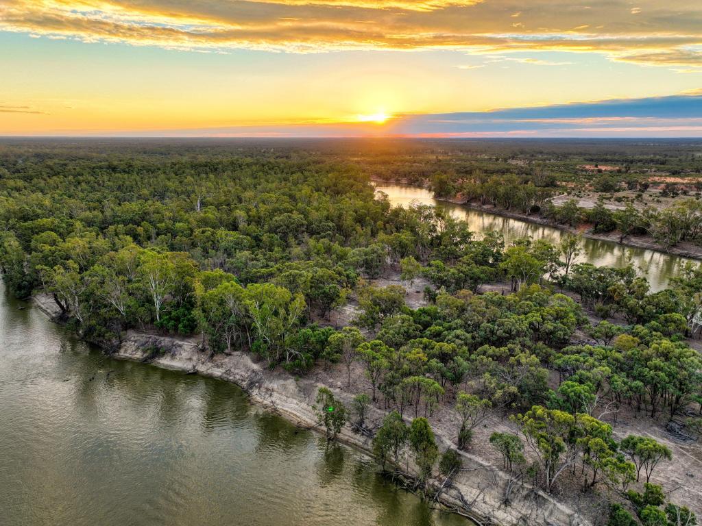 Hattah Kulkyne National Park, Victoria, Australia with a beautiful sunset overlooking the river and trees from above.