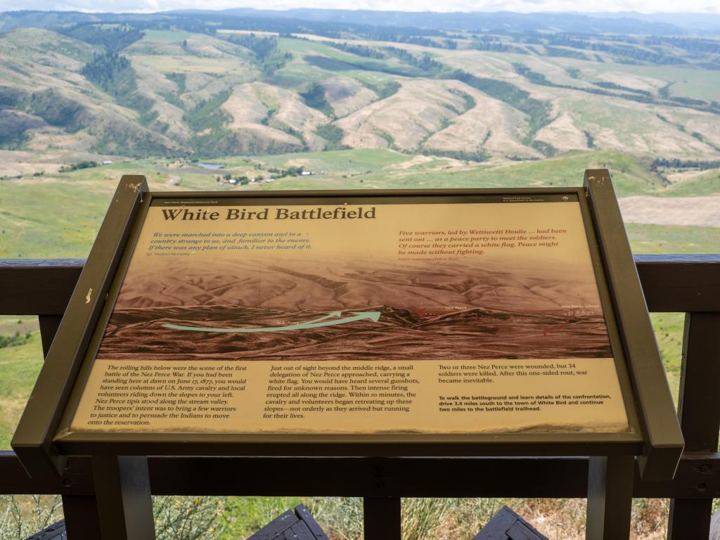 Sign for White Bird Battlefield at the Nez Perce National Historical Park, hills in the background
