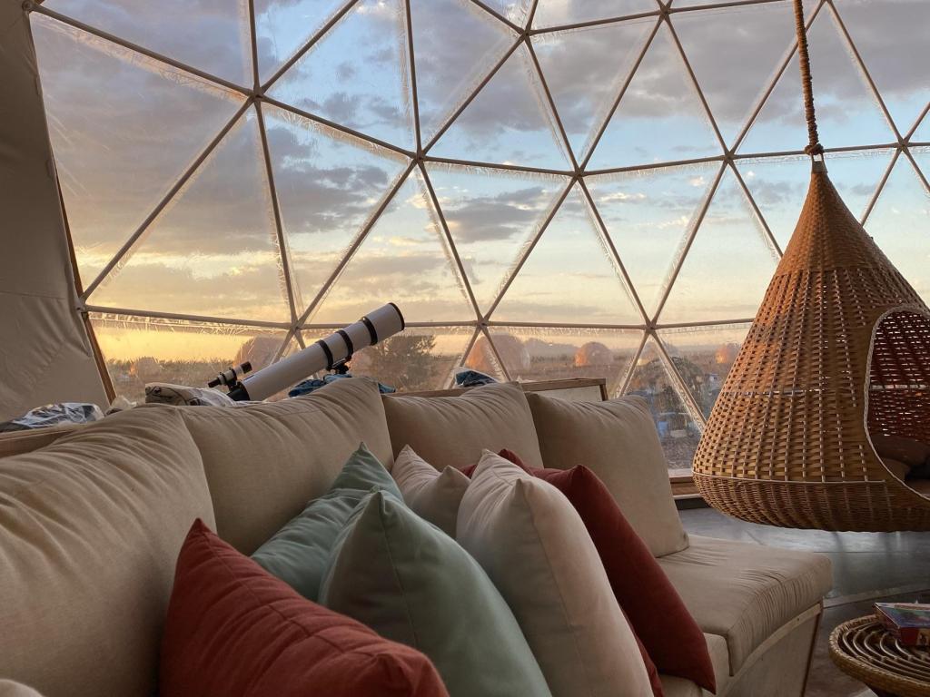 View of the sunset from inside a bedroom dome at Clear Sky Resorts Grand Canyon