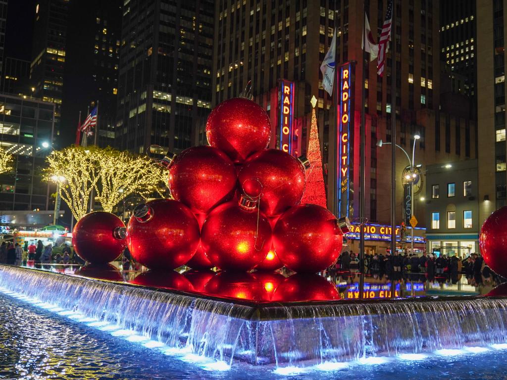 Christmas decorations at Rockefeller Center, New York, with Radio City Music Hall in the background