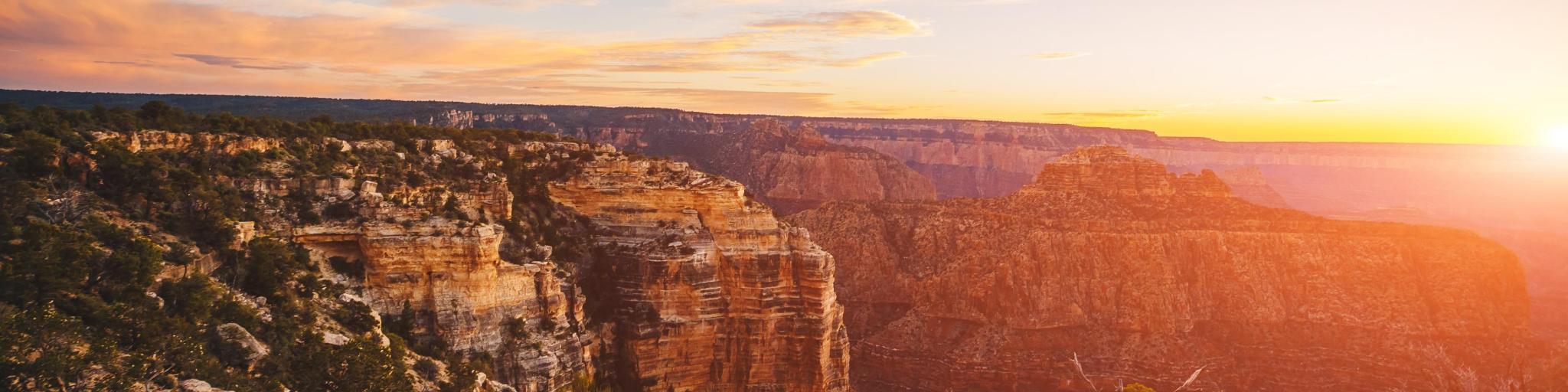 Grand Canyon National Park, Arizona, USA with a view of The River Colorado which runs through the Grand Canyon at sunset.