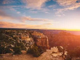 Grand Canyon National Park, Arizona, USA with a view of The River Colorado which runs through the Grand Canyon at sunset.