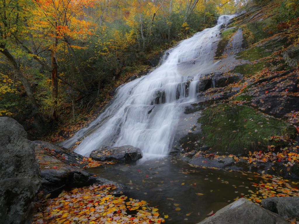 Beautiful waterfalls through rocks, a day in fall