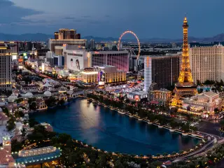 Panorama of the Las Vegas Boulevard and Bellagio Lake Como in Las Vegas, Nevada, USA at night.
