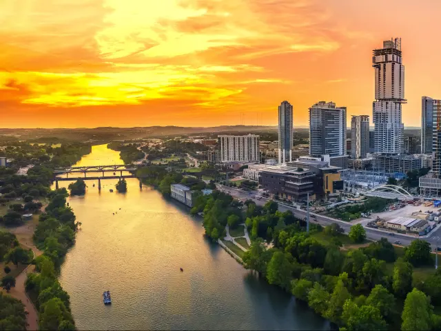 Austin, Texas, USA with the city skyline in the evening and blue hour taken as a panoramic shot.