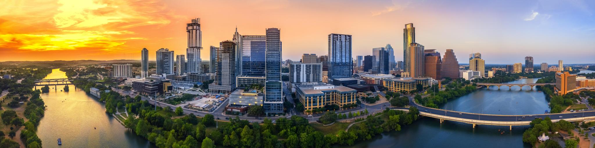 Austin, Texas, USA with the city skyline in the evening and blue hour taken as a panoramic shot.