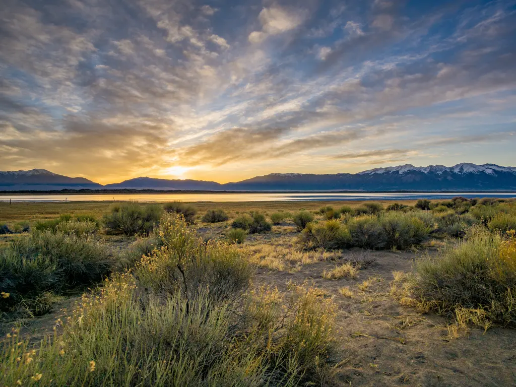 Sunset view of the valley with the Great Sand Dunes National Park visible in the distance