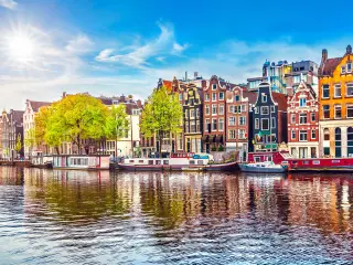 Colourful houses along the canal in Amsterdam