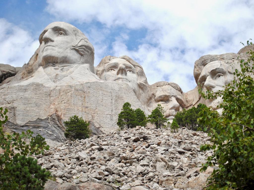 Unique perspective directly under the carving of Mount Rushmore from The Presidential Trail, Black Hills in Keystone, South Dakota, USA