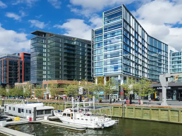 Outside view of Hyatt House Washington DC/The Wharf alongside the waterfront with boats moored