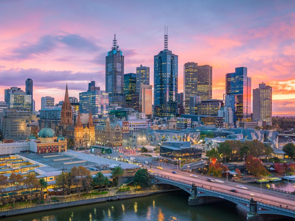 Melbourne Skyline at twilight, with skyscrapers set against a purple sky, Australia