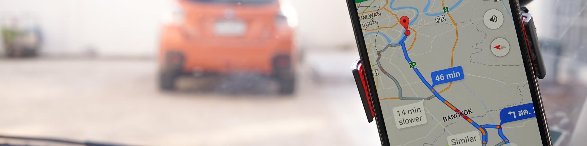 The Google Maps app on a phone screen in a car