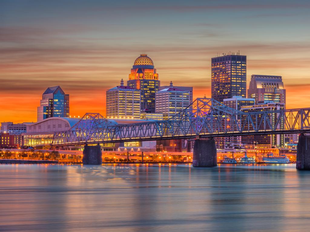 Louisville, Kentucky, USA downtown skyline at the river at dusk.