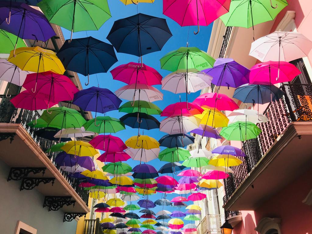 Bright Umbrellas handing above the street in Old San Juan Puerto Rico
