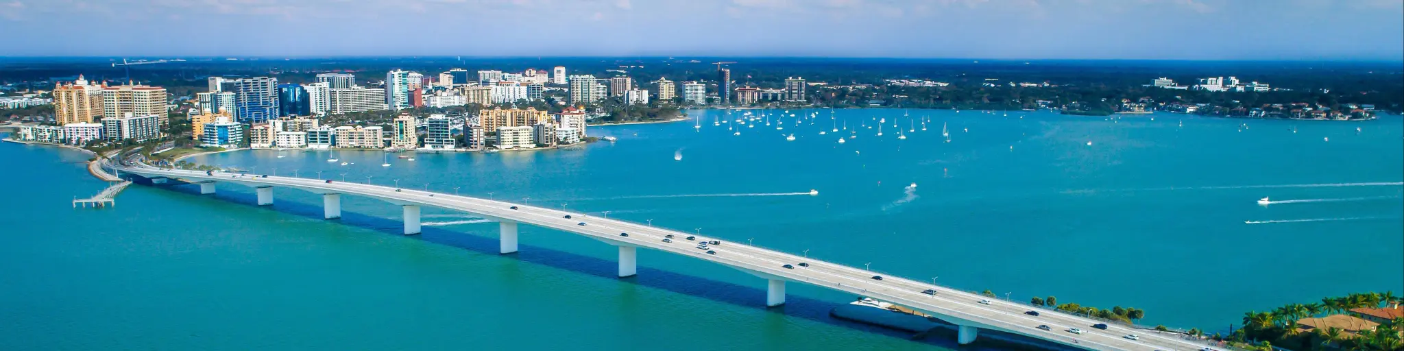 Ringling Bridge Downtown Sarasota Drone Panorama. Sunny Florida with beautiful blue waters.