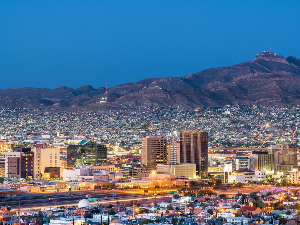 El Paso, Texas, USA downtown city skyline at dusk with Juarez, Mexico in the distance.