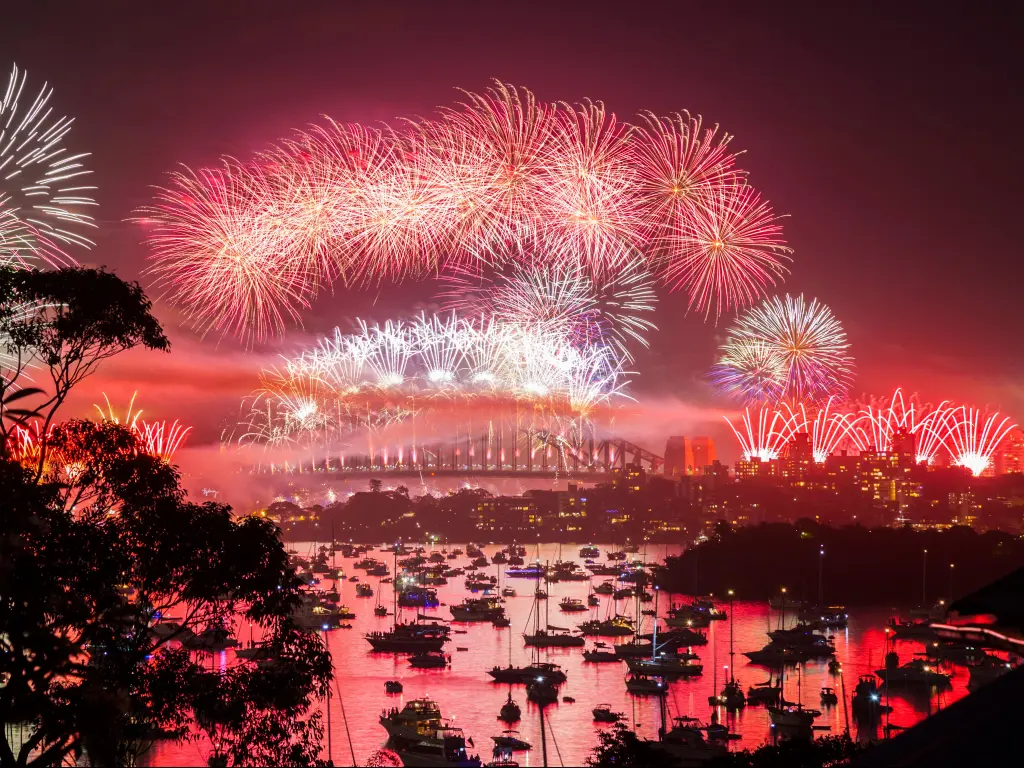 Fireworks in Sydney on New Years Eve, with boats in the foreground 