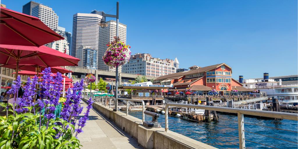 Flowers bloom on Pier 55 in Seattle, Washington, on a sunny day