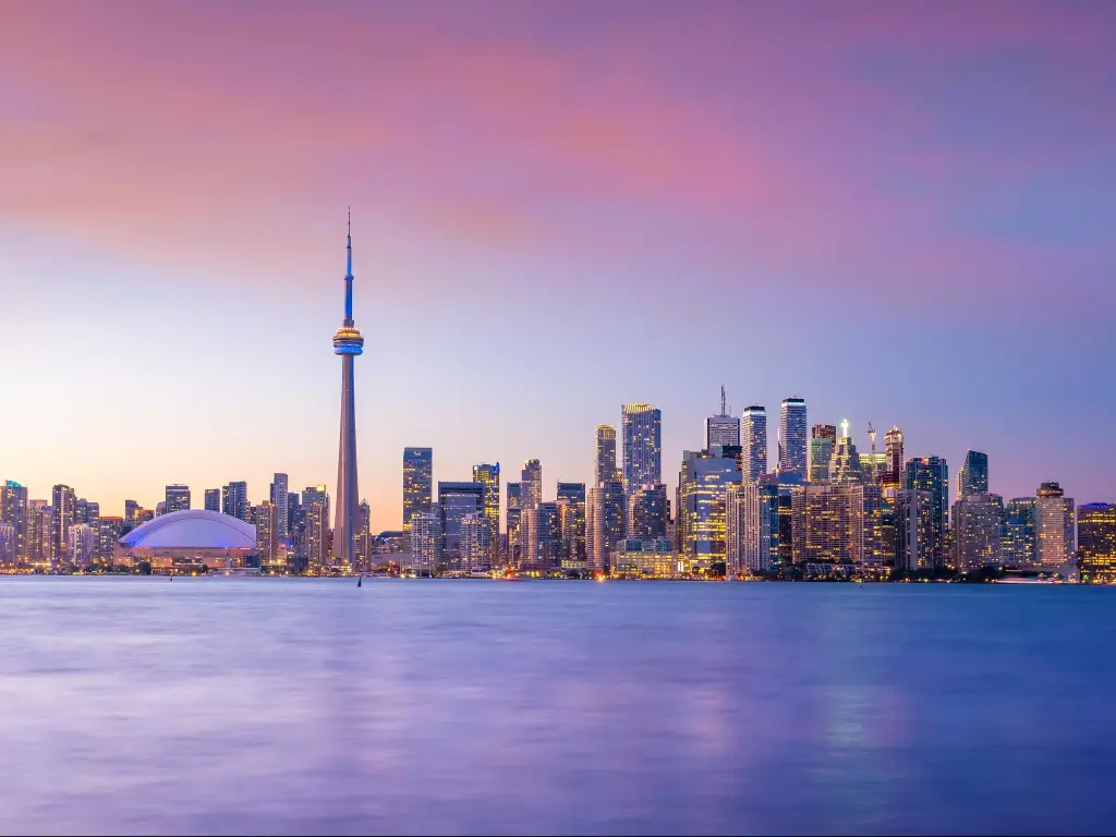 Toronto skyline from across the water at sunset.