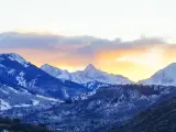 Mountains in the Aspen and Snowmass area of Colorado, with a dusky sky above