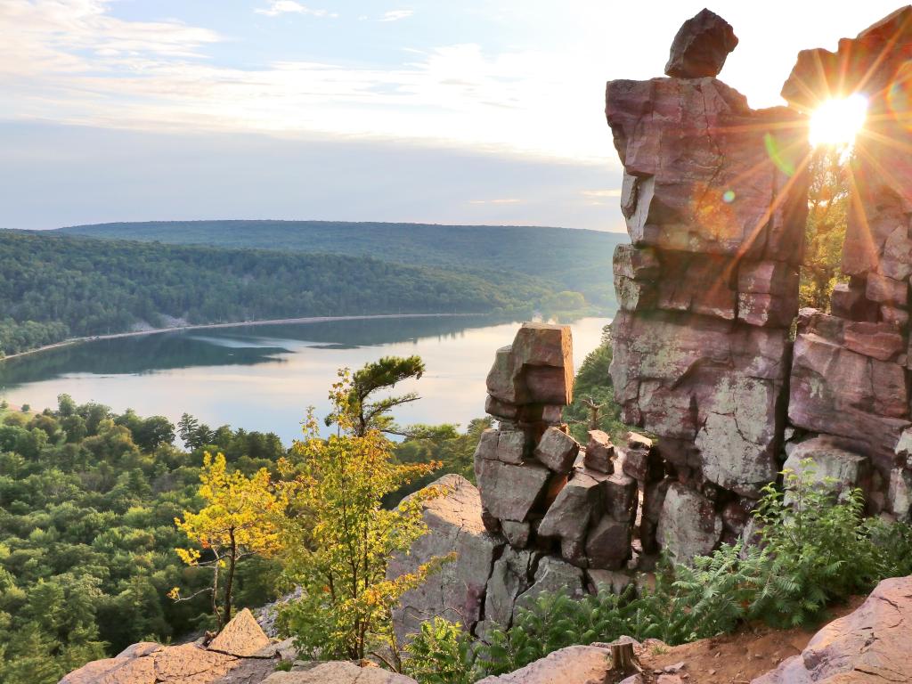 Devil's Lake State Park, Wisconsin, USA with an areal view on the South shore beach and lake from rocky ice age hiking trail during sunset. 
