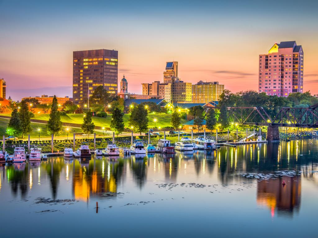 Augusta, Georgia, USA skyline on the Savannah River at dusk.