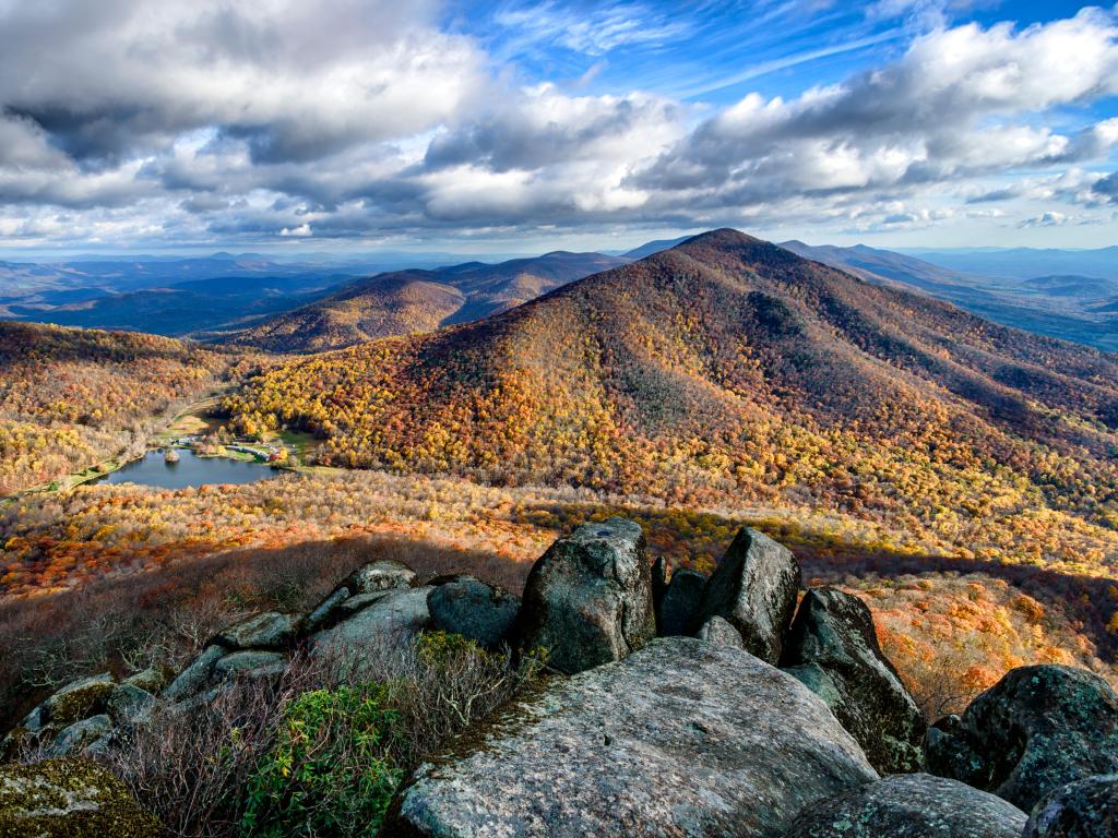 The view from the summit of Sharp Top over rugged mountains during fall