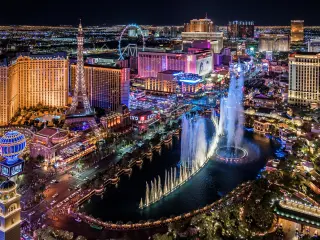 Panoramic view of the Strip at night with the neon lights on