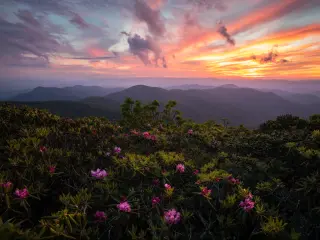 Colourful sunset with purple coloured mountains
