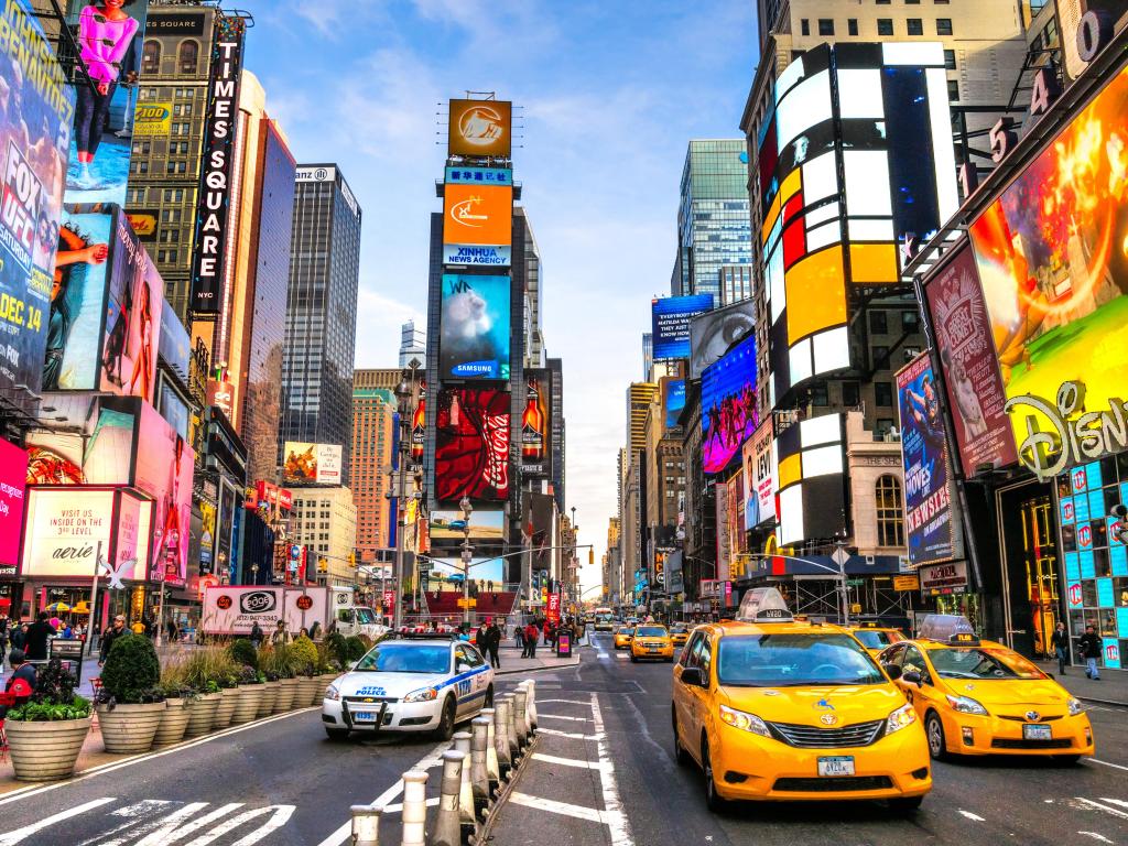 Times Square ,is a busy tourist intersection of neon art and commerce and is an iconic street of New York City and America, December 01th, 2013 in Manhattan, New York City.