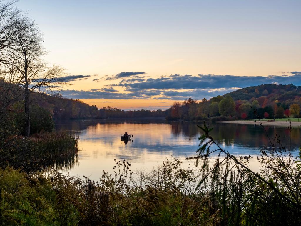 Keystone Lake in Keystone State Park in the Laurel Highlands of Pennsylvania in the fall before sunset.