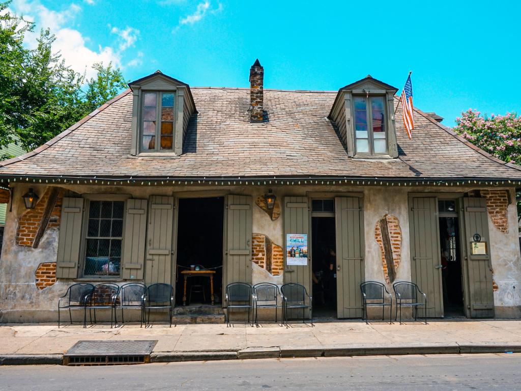 The facade of the famous blacksmith shop with some exposed brickwork on a sunny day