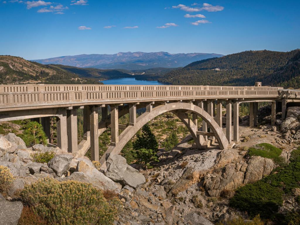 Donner Summit Bridge, aka Rainbow Bridge over Donner Pass on historic US Route 40 near Lake Tahoe, in Truckee, Nevada County, Northern California, hilltop view.