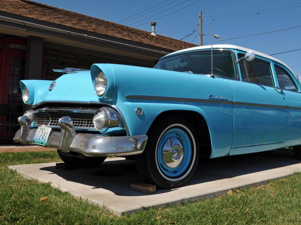 Blue classic Ford Customline automobile displayed at the Best Western Route 66 Rail Haven motel in Springfield, Missouri