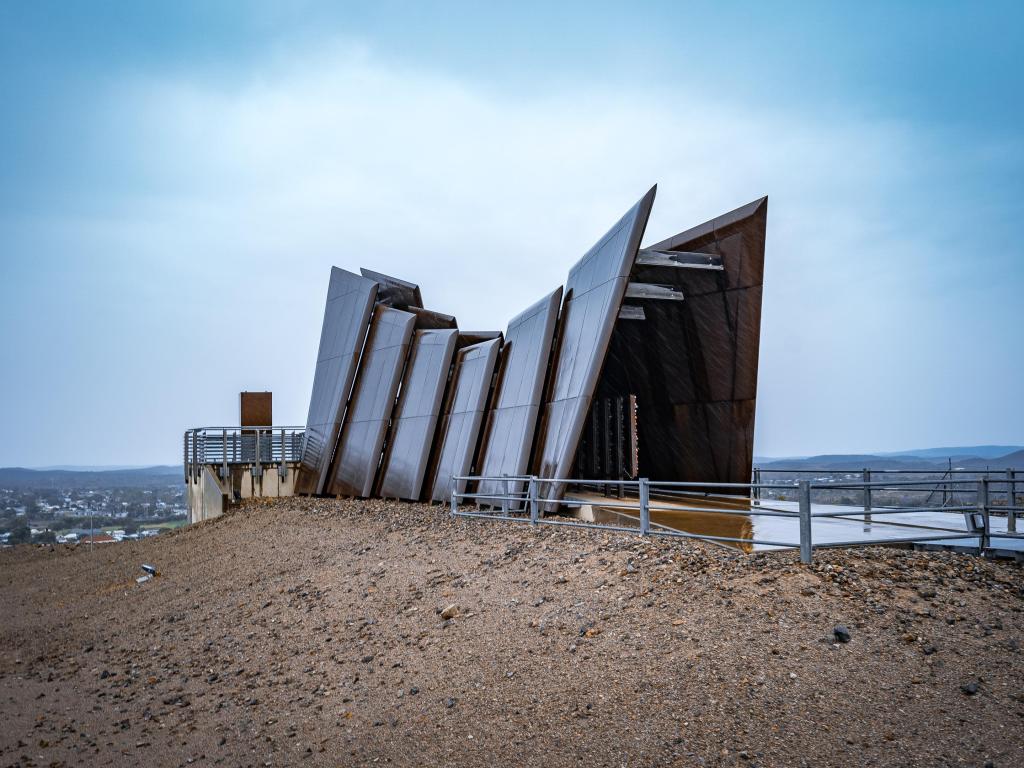 Line of Lode Miners Memorial, metal structure on an overcast day