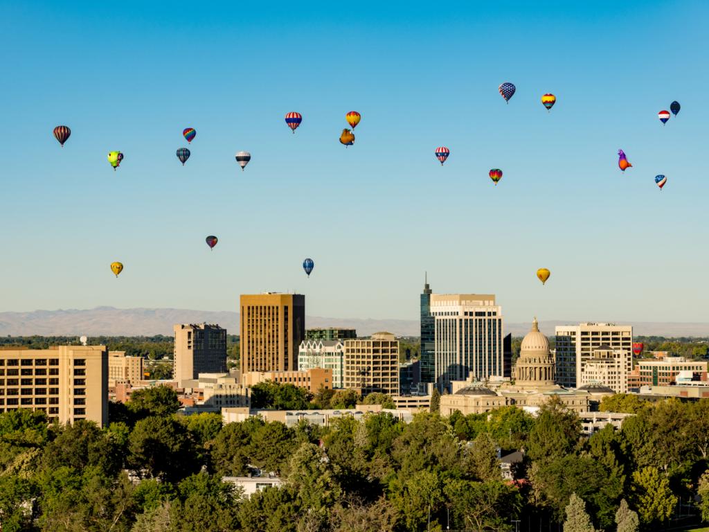 Hot air balloons float over the city during the Boise Balloon Classic in Idaho