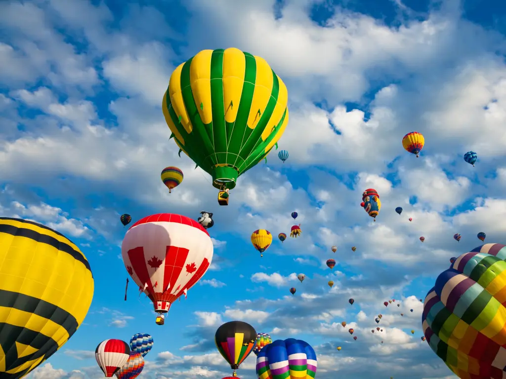 Dozens of colorful hot air balloons take flight at the International Hot Air Balloon Festival of Saint-Jean-sur-Richelieu 