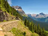 Going to the Sun Road, Montana, USA with a beautiful panoramic view of Logan Pass in Glacier National Park on a sunny day.