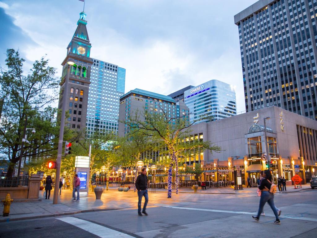 16th Street Mall in Downtown Denver at dusk, with pedestrians 