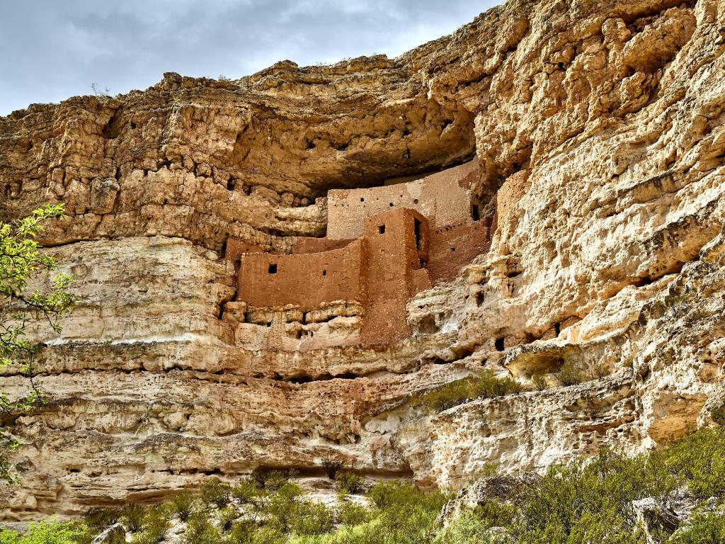 Montezuma Castle National Monument, Arizona, USA with a view of the ancient well preserved Native American cliff dwelling in side of mountain made out of stone.